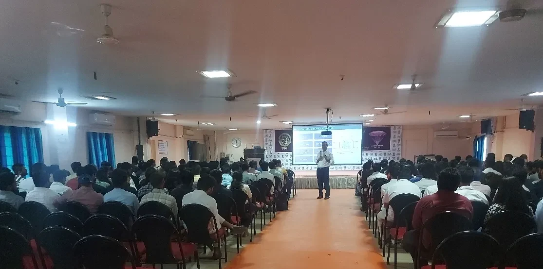 Faculty addressing students in an ICT-enabled auditorium session at SSIM