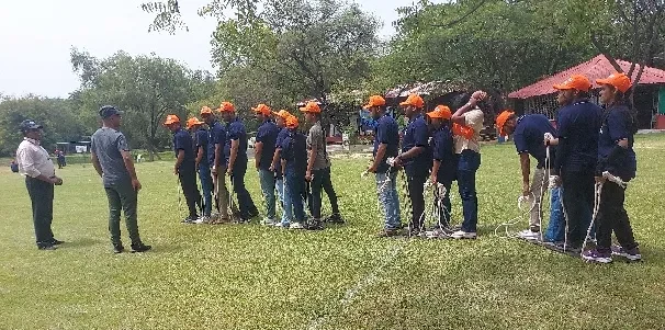 SSIM students in a group challenge at the outbound training campsite